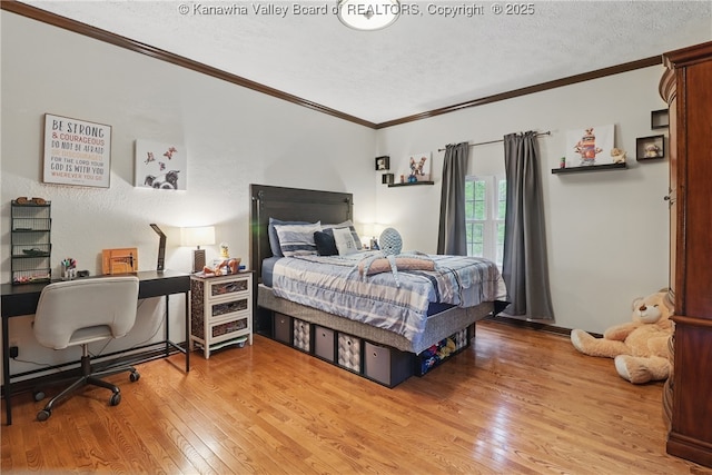 3282 Greenview Rd, South Charleston, WV 25303 - bedroom featuring a textured ceiling, light wood-style flooring, ornamental molding, and a desk