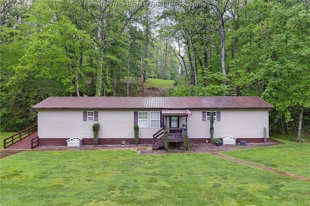 3282 Greenview Rd, South Charleston, WV 25303 - view of front of house with a front yard, metal roof, and a view of trees