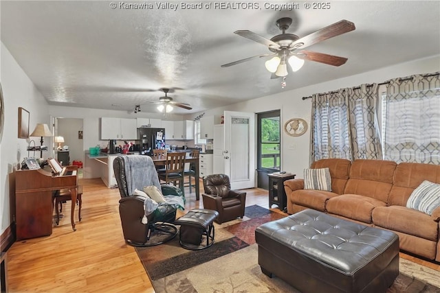 3282 Greenview Rd, South Charleston, WV 25303 - living room with ceiling fan and light wood-type flooring