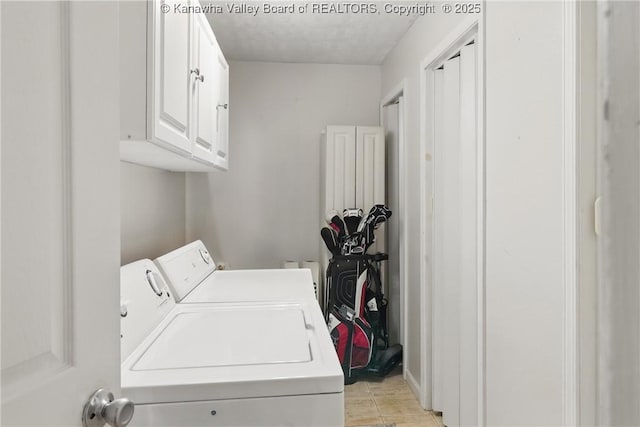 3282 Greenview Rd, South Charleston, WV 25303 - washroom with washer and dryer, cabinet space, and a textured ceiling