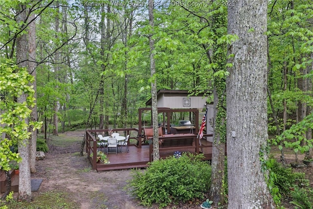 3282 Greenview Rd, South Charleston, WV 25303 - view of yard with a deck and a wooded view