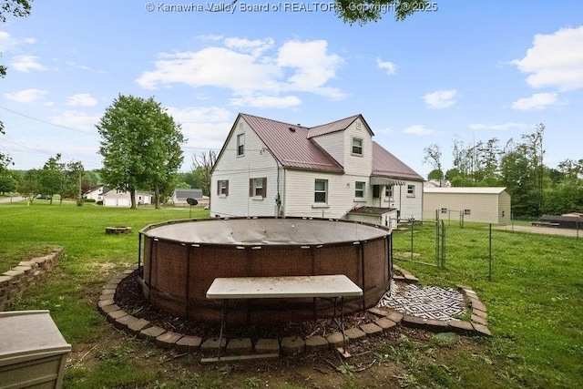 back of property with metal roof