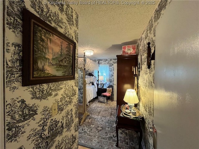 103 Chestnut Dr, Peytona, WV 25154 - corridor with a textured ceiling and wallpapered walls