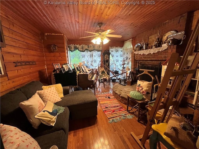 103 Chestnut Dr, Peytona, WV 25154 - living area featuring wooden ceiling, ceiling fan, hardwood / wood-style flooring, and wood walls