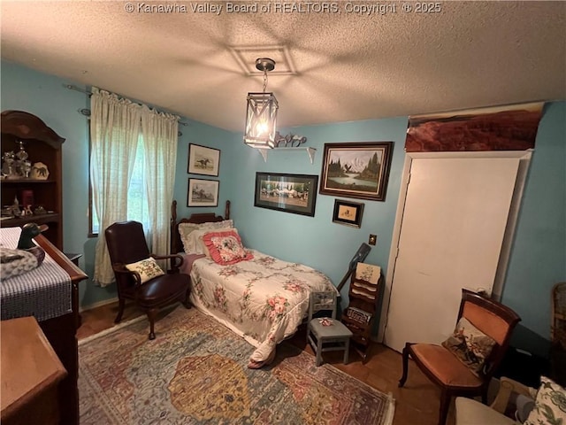103 Chestnut Dr, Peytona, WV 25154 - bedroom featuring a textured ceiling