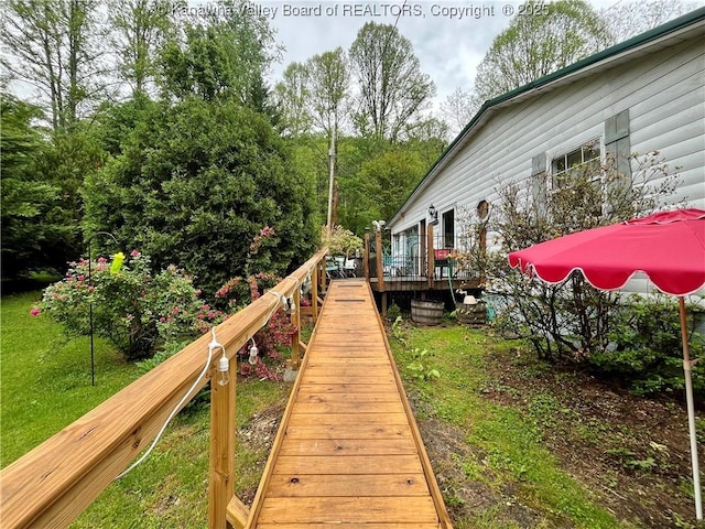 103 Chestnut Dr, Peytona, WV 25154 - deck featuring a lawn