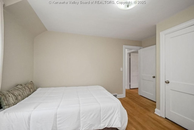 608 Kanawha Ave, Clendenin, WV 25045 - bedroom featuring light wood finished floors and baseboards