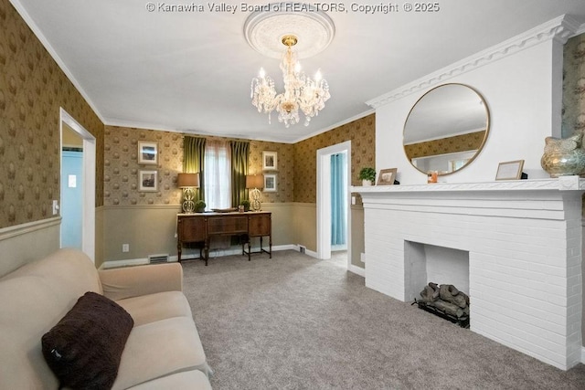 608 Kanawha Ave, Clendenin, WV 25045 - carpeted living room with wallpapered walls, wainscoting, a chandelier, crown molding, and a brick fireplace