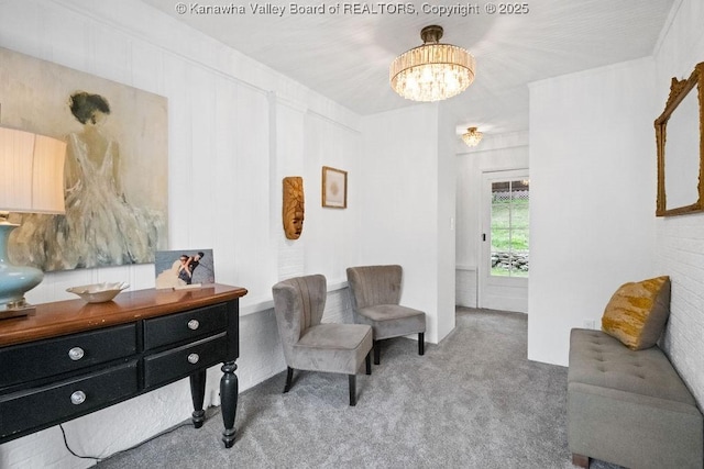 608 Kanawha Ave, Clendenin, WV 25045 - living area featuring carpet flooring and a chandelier