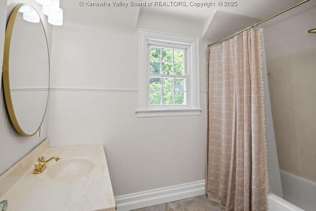 608 Kanawha Ave, Clendenin, WV 25045 - bathroom featuring baseboards, vanity, and shower / tub combo with curtain