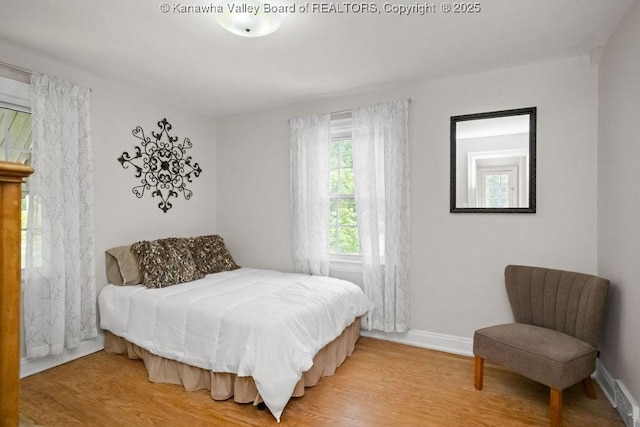 608 Kanawha Ave, Clendenin, WV 25045 - bedroom featuring wood finished floors and baseboards
