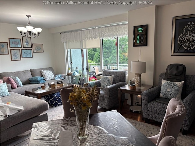 1800 Roundhill Rd Unit 901, Charleston, WV 25304 - living area featuring a chandelier and wood finished floors