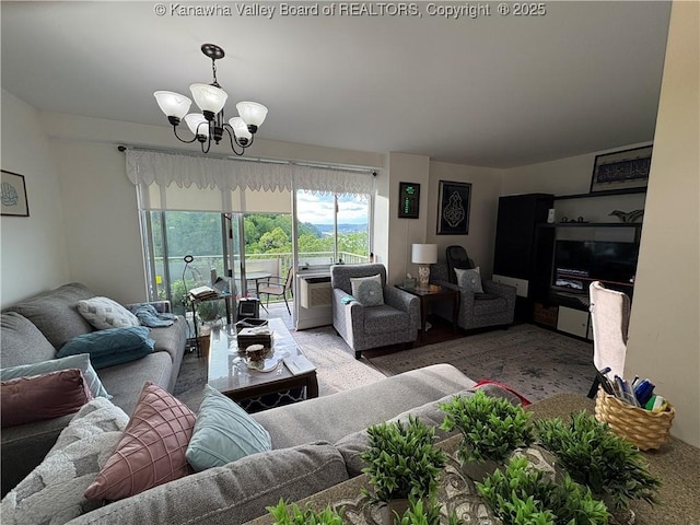 1800 Roundhill Rd Unit 901, Charleston, WV 25304 - living area with a chandelier