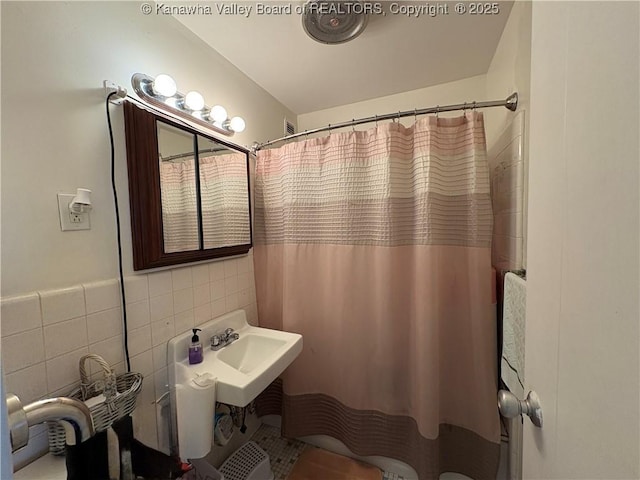 1800 Roundhill Rd Unit 901, Charleston, WV 25304 - bathroom with tile walls and a shower with curtain