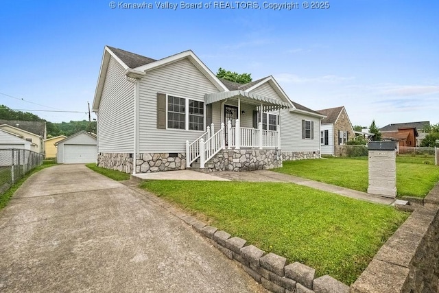5211 Ohio St, South Charleston, WV 25309 - view of front of home with a garage, crawl space, an outbuilding, and concrete driveway