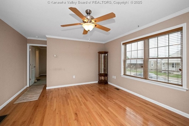 5211 Ohio St, South Charleston, WV 25309 - unfurnished room with light wood-type flooring, ornamental molding, a ceiling fan, and baseboards