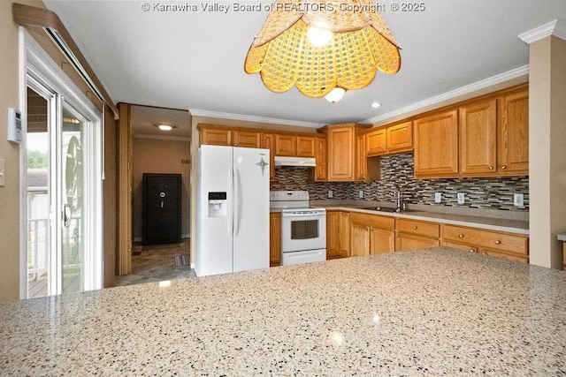 5211 Ohio St, South Charleston, WV 25309 - kitchen with white appliances, under cabinet range hood, ornamental molding, tasteful backsplash, and light stone countertops