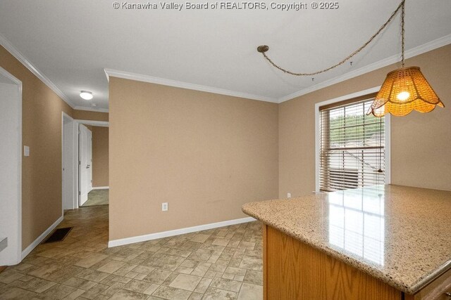 5211 Ohio St, South Charleston, WV 25309 - kitchen with ornamental molding, stone finish flooring, baseboards, light stone countertops, and pendant lighting