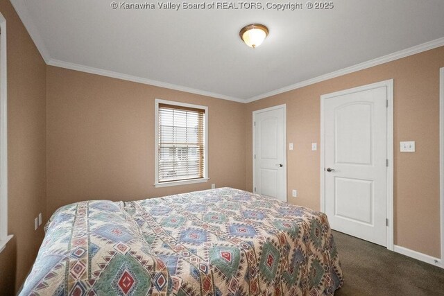 5211 Ohio St, South Charleston, WV 25309 - bedroom featuring crown molding, dark colored carpet, and baseboards