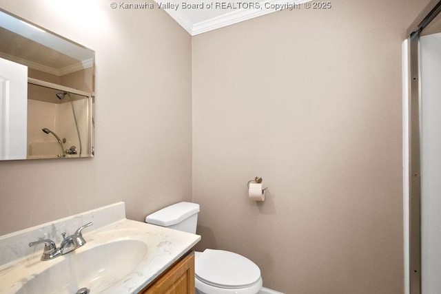 5211 Ohio St, South Charleston, WV 25309 - bathroom featuring ornamental molding, toilet, vanity, and a shower