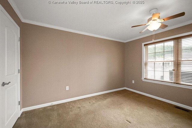 5211 Ohio St, South Charleston, WV 25309 - carpeted spare room with baseboards, ceiling fan, and ornamental molding