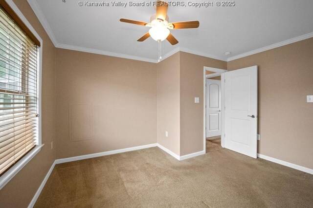 5211 Ohio St, South Charleston, WV 25309 - unfurnished bedroom with baseboards, carpet, crown molding, and ceiling fan