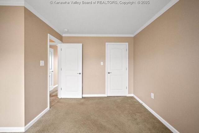 5211 Ohio St, South Charleston, WV 25309 - unfurnished bedroom featuring crown molding, baseboards, and carpet floors