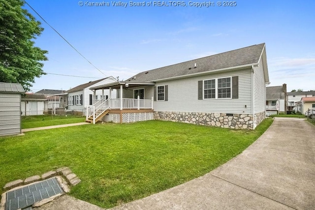 5211 Ohio St, South Charleston, WV 25309 - back of property featuring a yard, crawl space, a shingled roof, and a porch