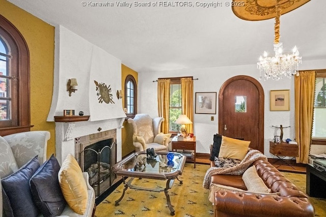 606 Fort Hill Dr, Charleston, WV 25314 - living area with a chandelier and a fireplace