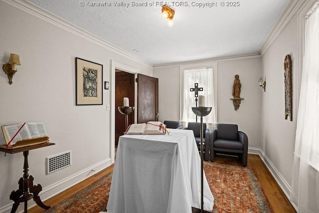 606 Fort Hill Dr, Charleston, WV 25314 - bedroom featuring dark wood finished floors, ornamental molding, baseboards, and a textured ceiling