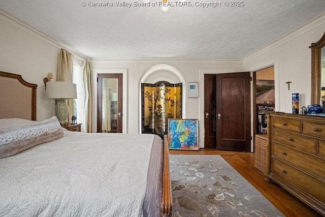 606 Fort Hill Dr, Charleston, WV 25314 - bedroom featuring wood finished floors, ornamental molding, and a textured ceiling