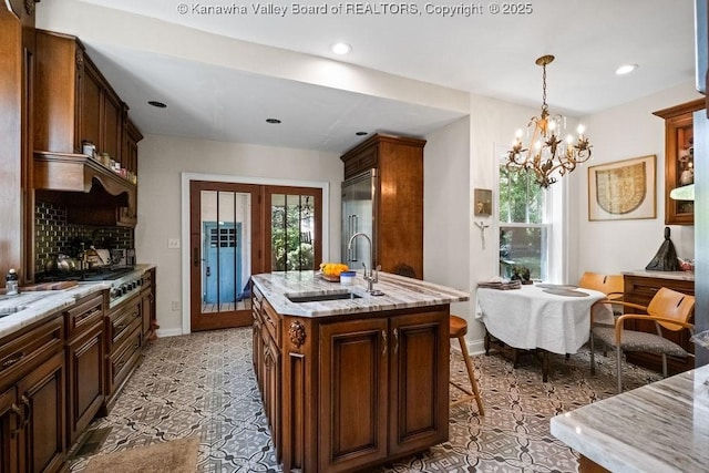 606 Fort Hill Dr, Charleston, WV 25314 - kitchen featuring a sink, healthy amount of natural light, a chandelier, stainless steel appliances, and recessed lighting