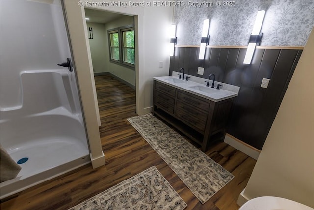 352 Hidden Valley Rd, Chapmanville, WV 25508 - bathroom with a shower, wood finished floors, baseboards, and wallpapered walls