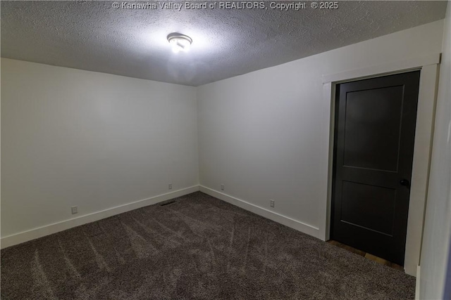 352 Hidden Valley Rd, Chapmanville, WV 25508 - empty room featuring carpet, a textured ceiling, and baseboards