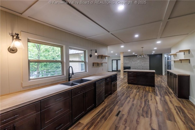 352 Hidden Valley Rd, Chapmanville, WV 25508 - kitchen featuring a sink, black dishwasher, wood finished floors, open shelves, and light countertops