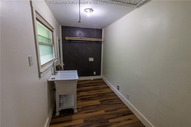 352 Hidden Valley Rd, Chapmanville, WV 25508 - laundry room featuring dark wood finished floors, baseboards, and a sink