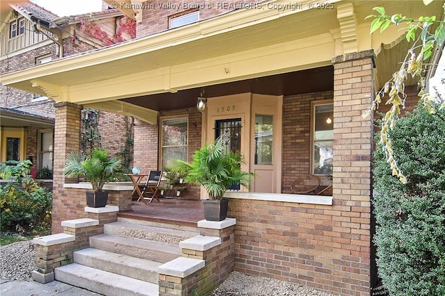 1505 Lee St E, Charleston, WV 25311 - property entrance featuring covered porch and brick siding