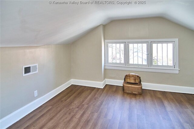 1505 Lee St E, Charleston, WV 25311 - bonus room featuring wood finished floors, lofted ceiling, and baseboards