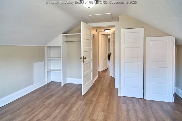 1505 Lee St E, Charleston, WV 25311 - bonus room with wood finished floors, lofted ceiling, baseboards, and built in shelves