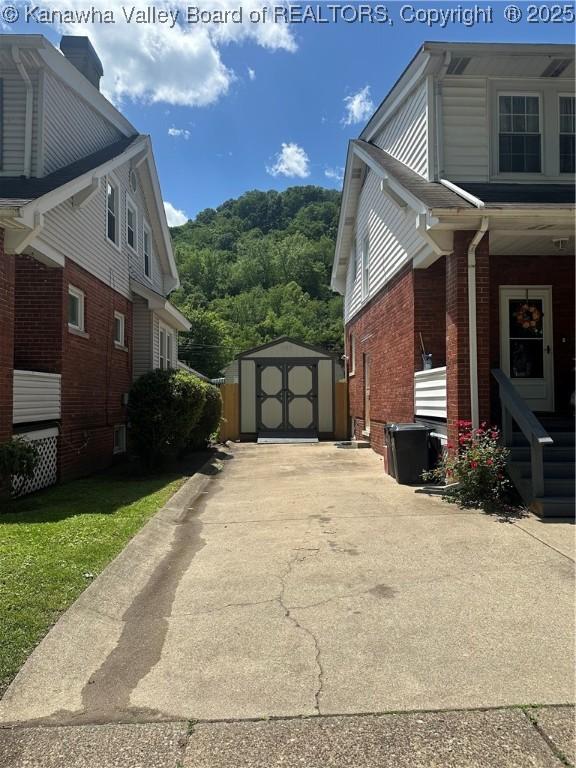 5505 Washington Ave, Charleston, WV 25304 - view of home's exterior featuring brick siding and covered porch