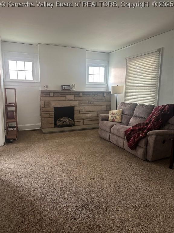5505 Washington Ave, Charleston, WV 25304 - living area featuring a stone fireplace and carpet flooring