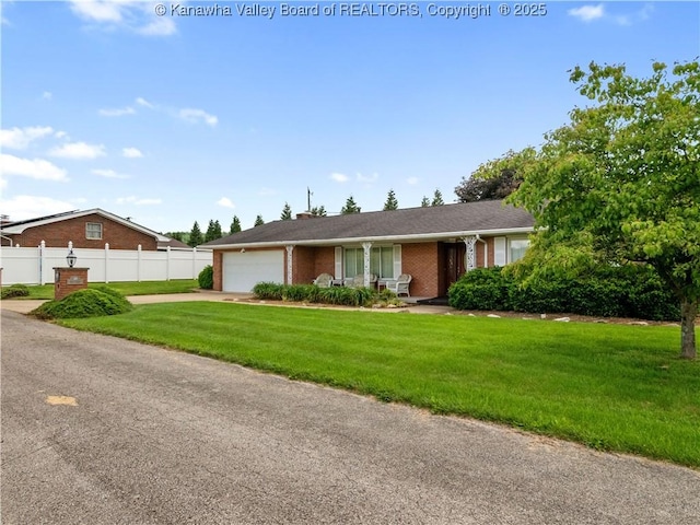 view of front facade with a garage, brick siding, and concrete driveway