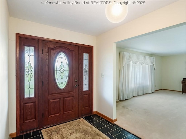 entrance foyer with baseboards