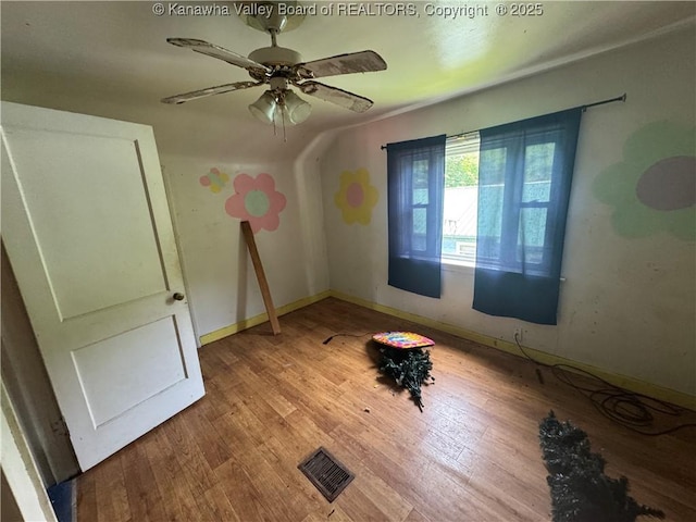391 Mckinley St, Wharton, WV 25208 - unfurnished bedroom with light wood finished floors, baseboards, and ceiling fan