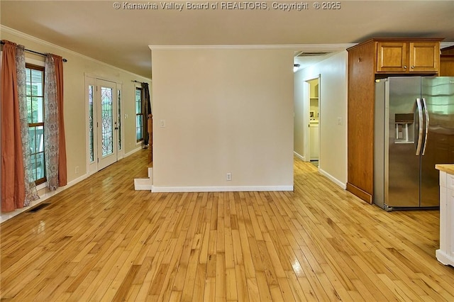 106 Coon Hollow Rd, Charleston, WV 25312 - unfurnished room featuring crown molding, light wood finished floors, and baseboards
