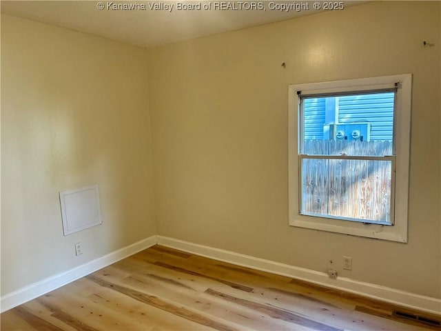 1005 E St, South Charleston, WV 25303 - unfurnished room featuring wood finished floors and baseboards