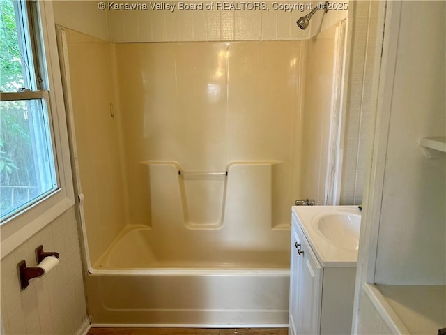 1005 E St, South Charleston, WV 25303 - bathroom featuring vanity and washtub / shower combination