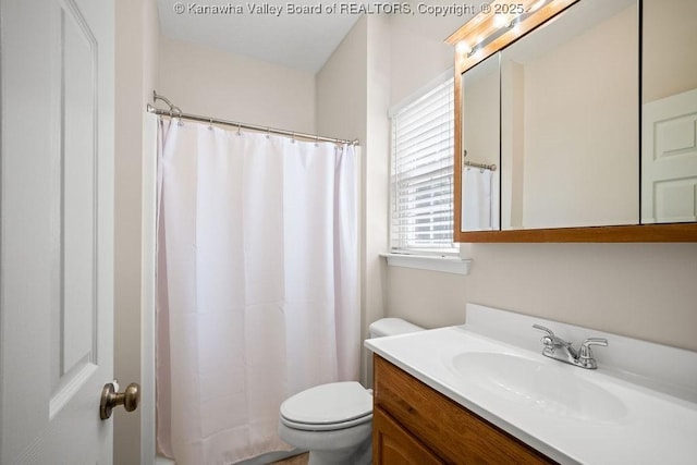 16 Pinnacle Dr, Charleston, WV 25311 - full bathroom with toilet, vanity, and curtained shower