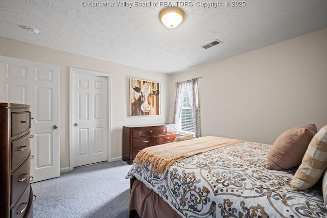 16 Pinnacle Dr, Charleston, WV 25311 - carpeted bedroom featuring baseboards and a textured ceiling