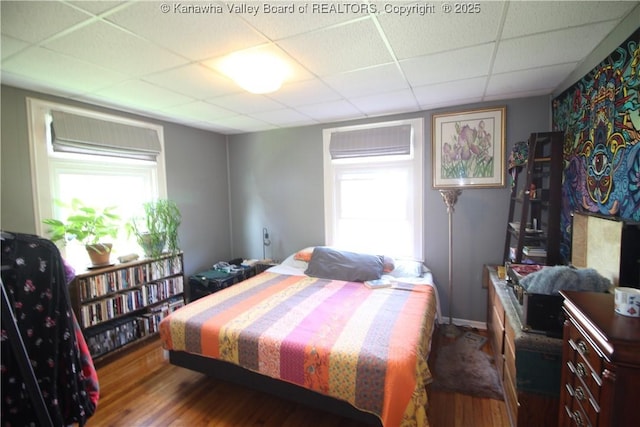 515 Maxwell St, Charleston, WV 25311 - bedroom with a paneled ceiling and wood finished floors